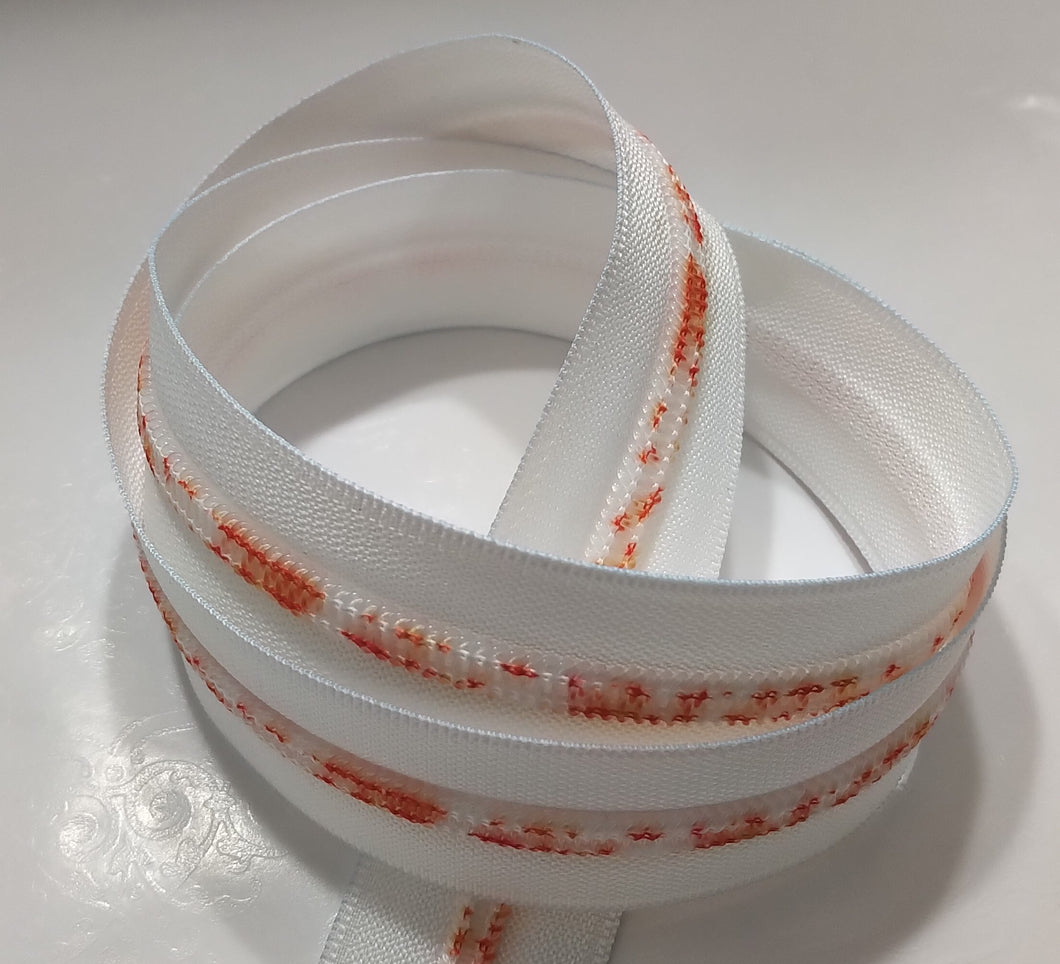 Zipper Tape - White with Orange Burst Teeth